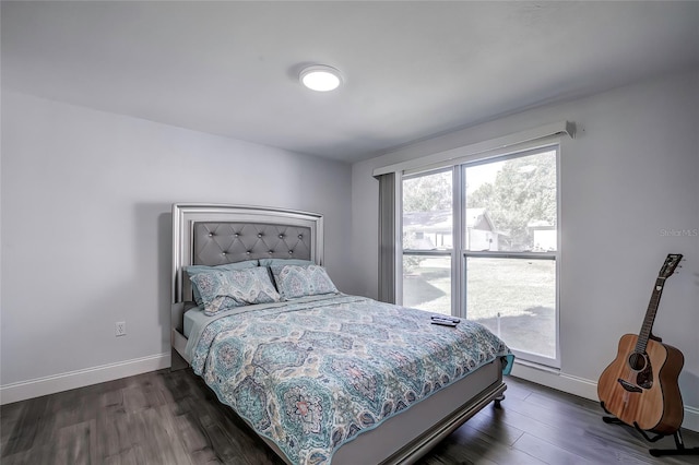 bedroom featuring dark wood-type flooring