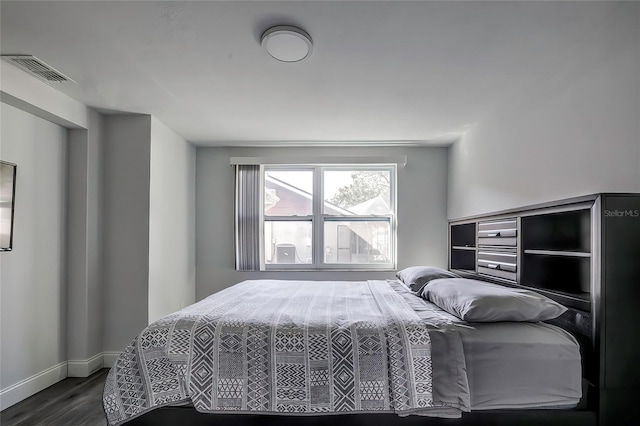 bedroom featuring hardwood / wood-style flooring