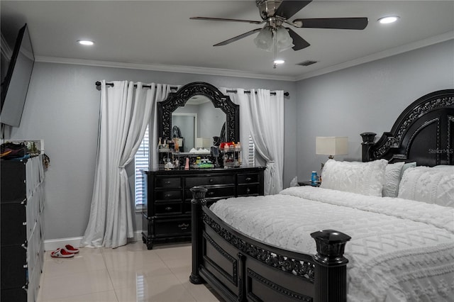 bedroom with ornamental molding and ceiling fan