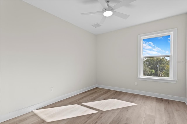 unfurnished room with ceiling fan and light hardwood / wood-style floors