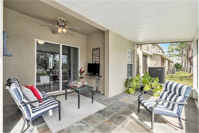 view of patio / terrace featuring ceiling fan