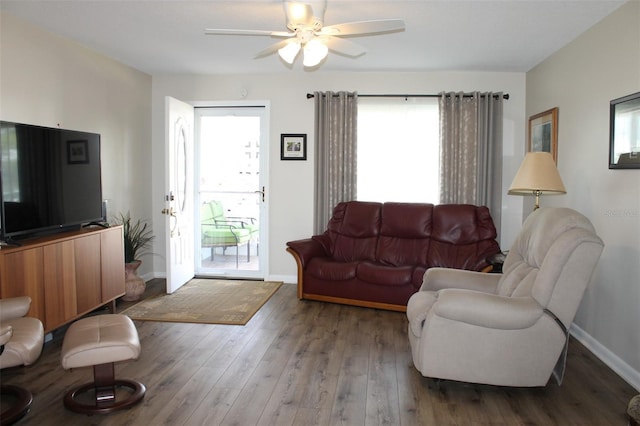 4460 95th Ave N Unit 1, Pinellas Park, FL 33782 - living room with hardwood / wood-style flooring, baseboards, and a ceiling fan