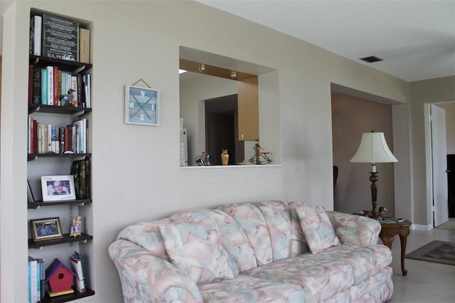 living room featuring light tile patterned floors