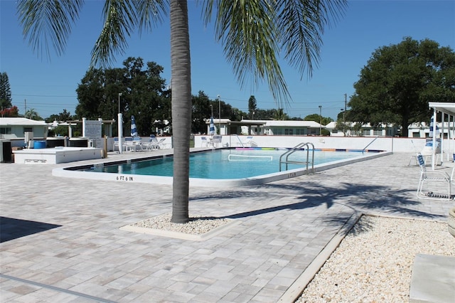 4460 95th Ave N Unit 1, Pinellas Park, FL 33782 - pool with a patio