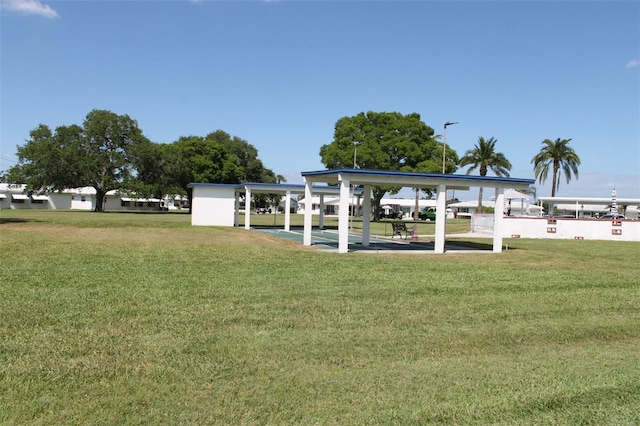 view of home's community featuring a lawn