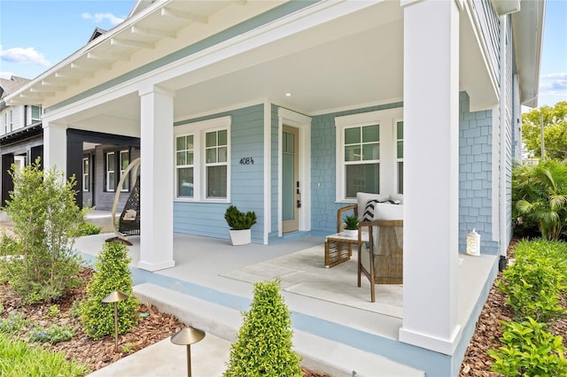 property entrance featuring covered porch