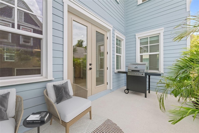 exterior space featuring grilling area and french doors
