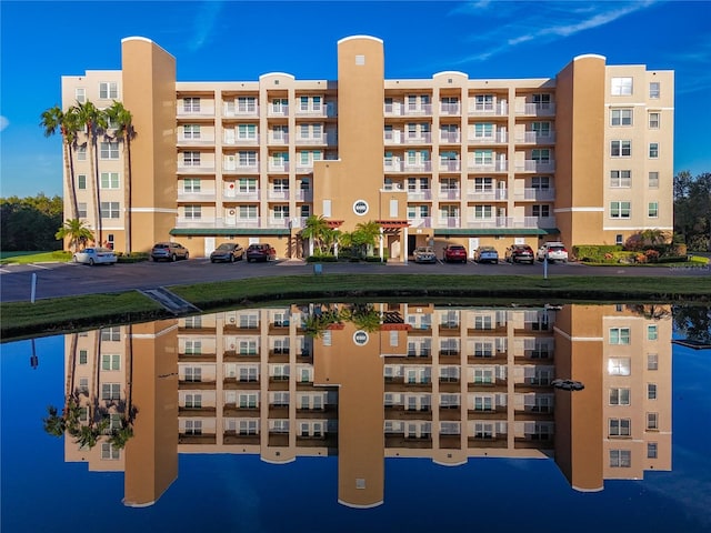 view of building exterior featuring a water view