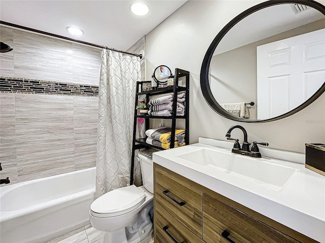 full bathroom with vanity, shower / bath combo, toilet, and tile patterned floors