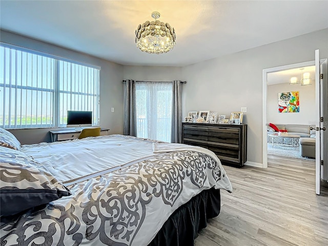 bedroom featuring light wood-type flooring