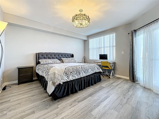 bedroom with light wood-type flooring