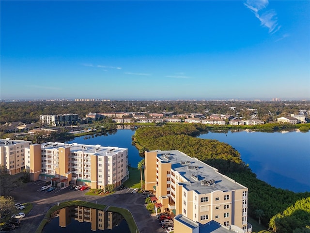 birds eye view of property with a water view