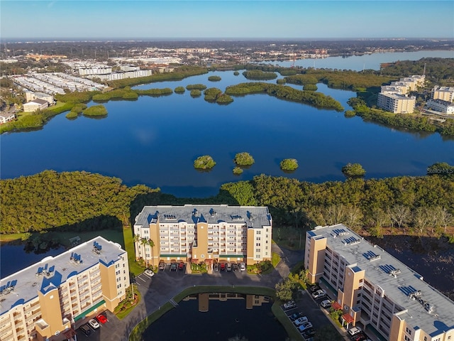 drone / aerial view with a water view