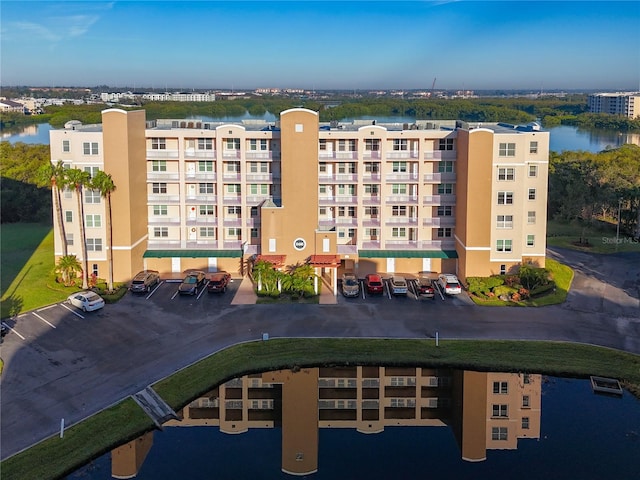 view of building exterior featuring a water view