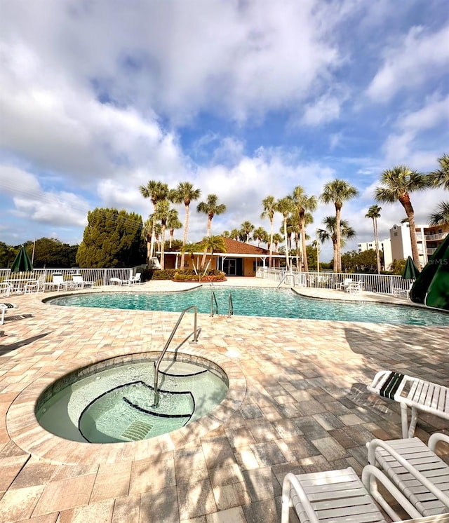 view of swimming pool featuring a patio