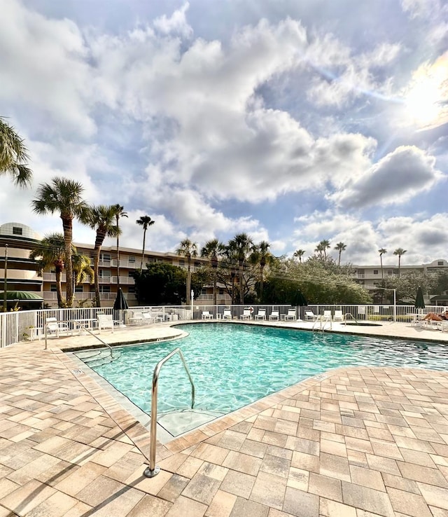 view of pool featuring a patio area