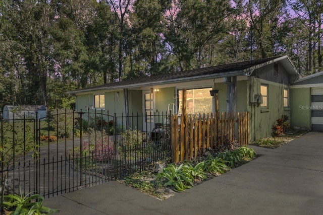 view of front of property with a garage