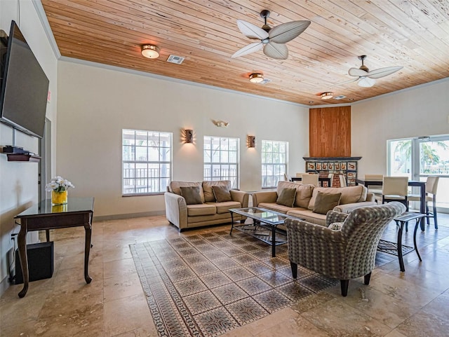 living room featuring wood ceiling, ornamental molding, plenty of natural light, and ceiling fan