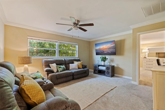 living room featuring ceiling fan, light colored carpet, and ornamental molding