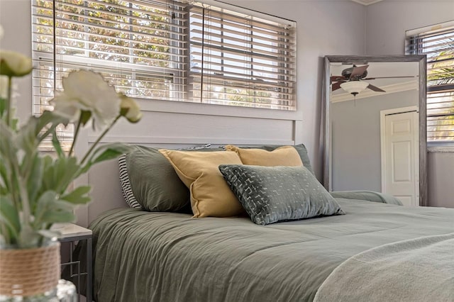 bedroom with ornamental molding