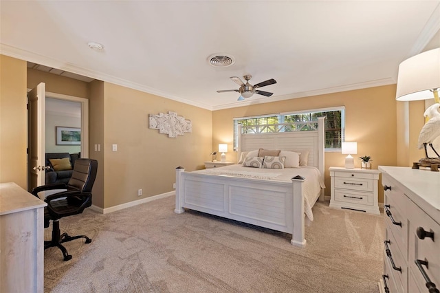 carpeted bedroom with ceiling fan and crown molding