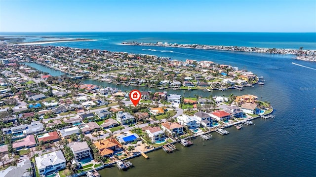 bird's eye view featuring a water view and a residential view