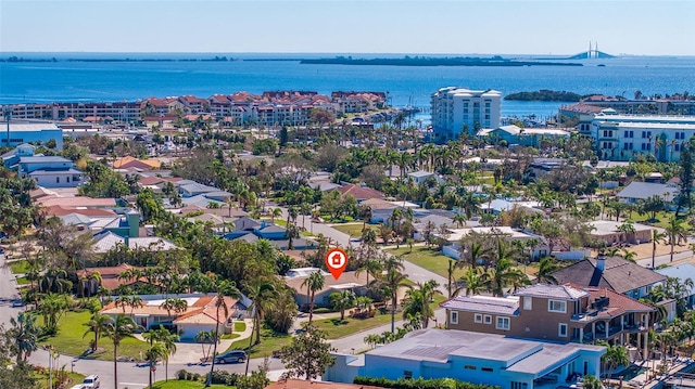 bird's eye view with a residential view and a water view