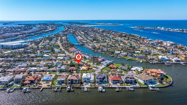 aerial view with a residential view and a water view