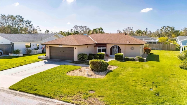 ranch-style home with a front yard and a garage