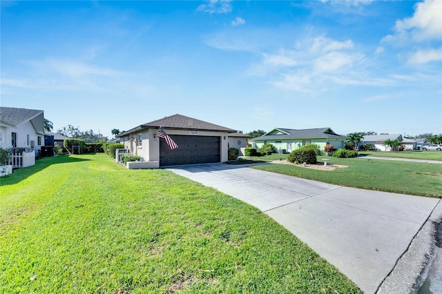 single story home featuring a front lawn and a garage