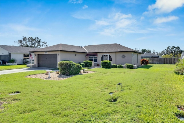 single story home with a front yard and a garage