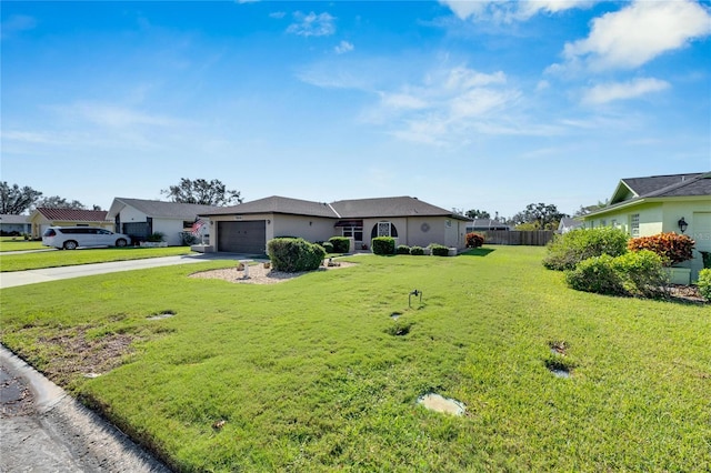 view of front facade featuring a front yard and a garage