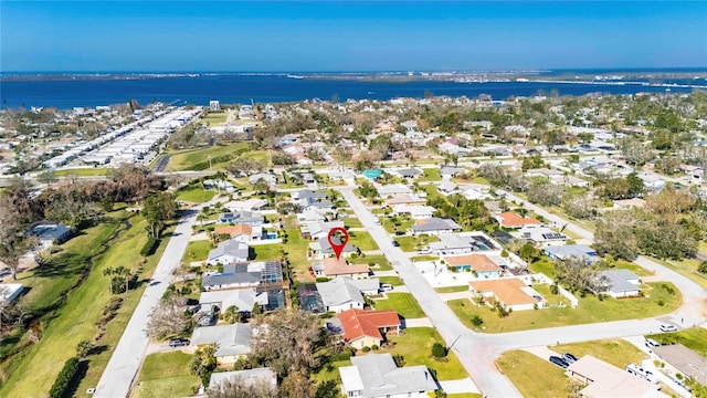 drone / aerial view with a water view