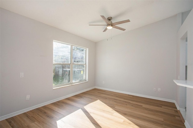 unfurnished room featuring ceiling fan and light hardwood / wood-style flooring