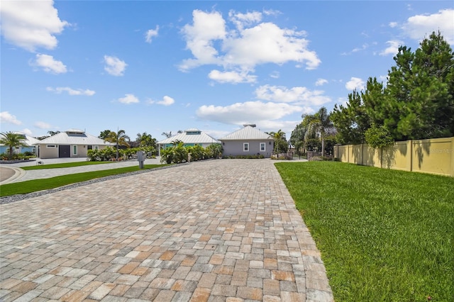 view of front of home with a front lawn