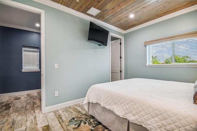 bedroom featuring ornamental molding, wooden ceiling, and wood-type flooring