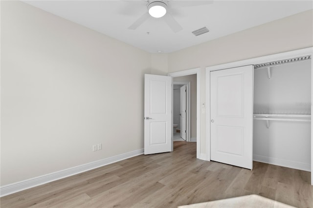 unfurnished bedroom featuring a closet, ceiling fan, and light hardwood / wood-style floors