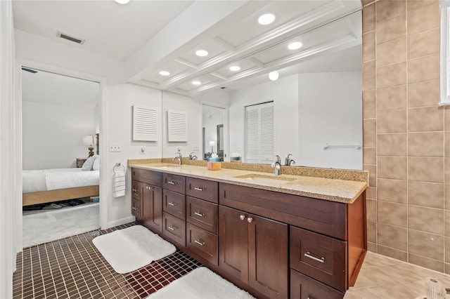 bathroom featuring vanity and tile patterned flooring