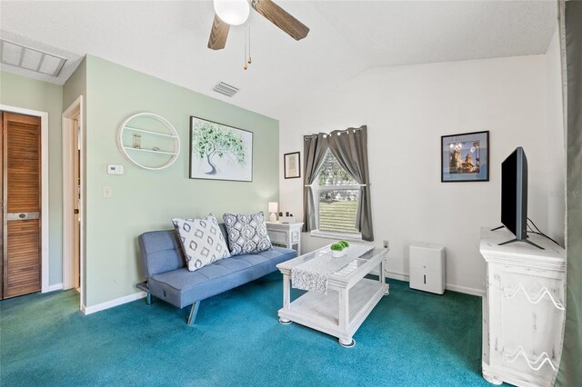 carpeted living room featuring lofted ceiling and ceiling fan