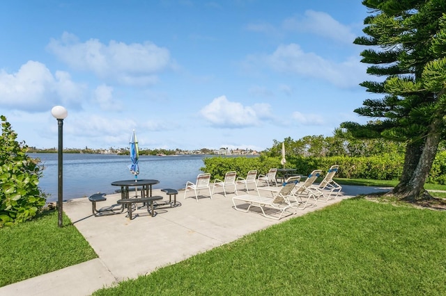 view of patio / terrace with a water view