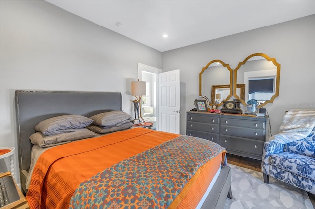 bedroom with hardwood / wood-style floors