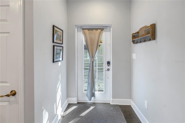 doorway featuring dark hardwood / wood-style flooring