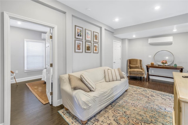 living room with dark hardwood / wood-style floors and an AC wall unit