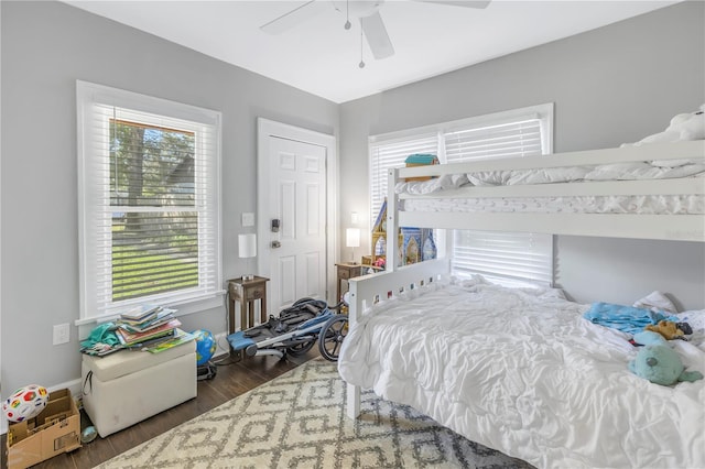 bedroom featuring dark wood-type flooring and ceiling fan