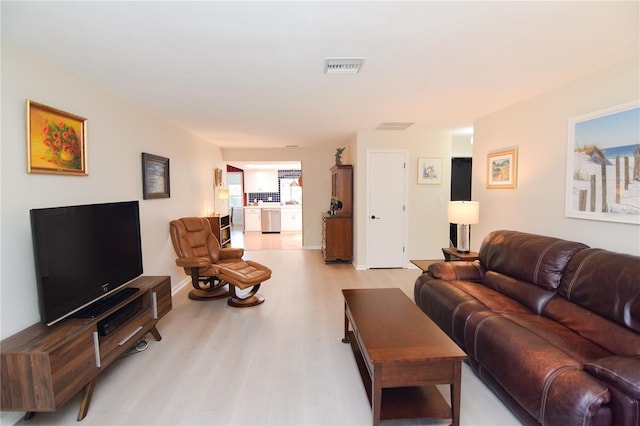 living room featuring light wood-type flooring