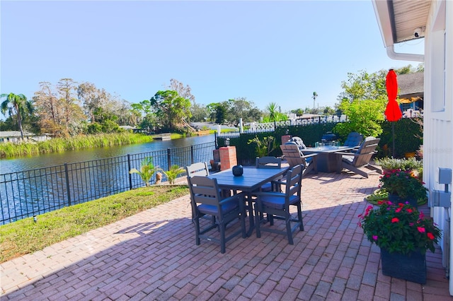 view of patio / terrace featuring a water view