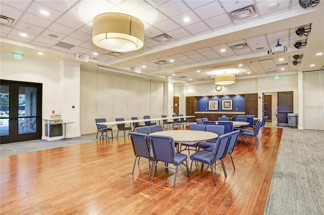 dining room featuring french doors and hardwood / wood-style floors