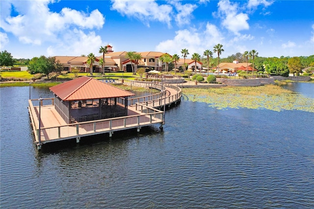 view of dock featuring a water view and a gazebo