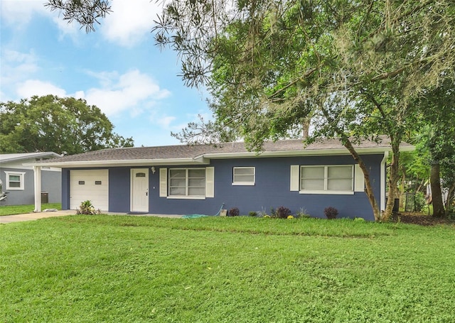 single story home with a front lawn and a garage