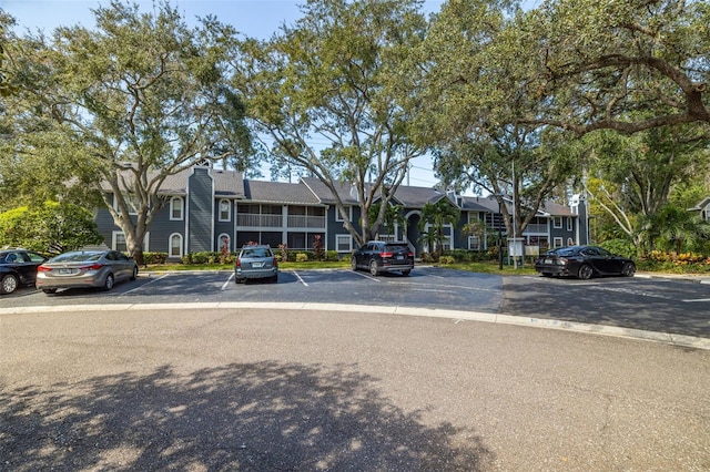2101 Fox Chase Blvd Unit 106, Palm Harbor, FL 34683 - view of property with uncovered parking